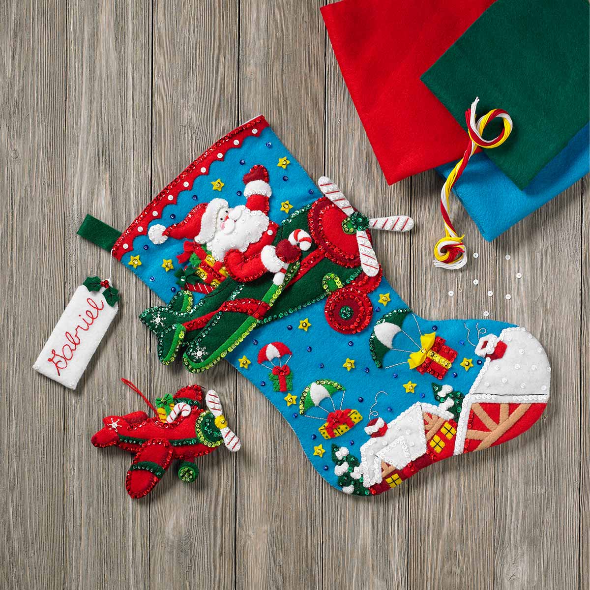 Shop Plaid Bucilla ® Seasonal Felt Stocking Kits Airplane Santa