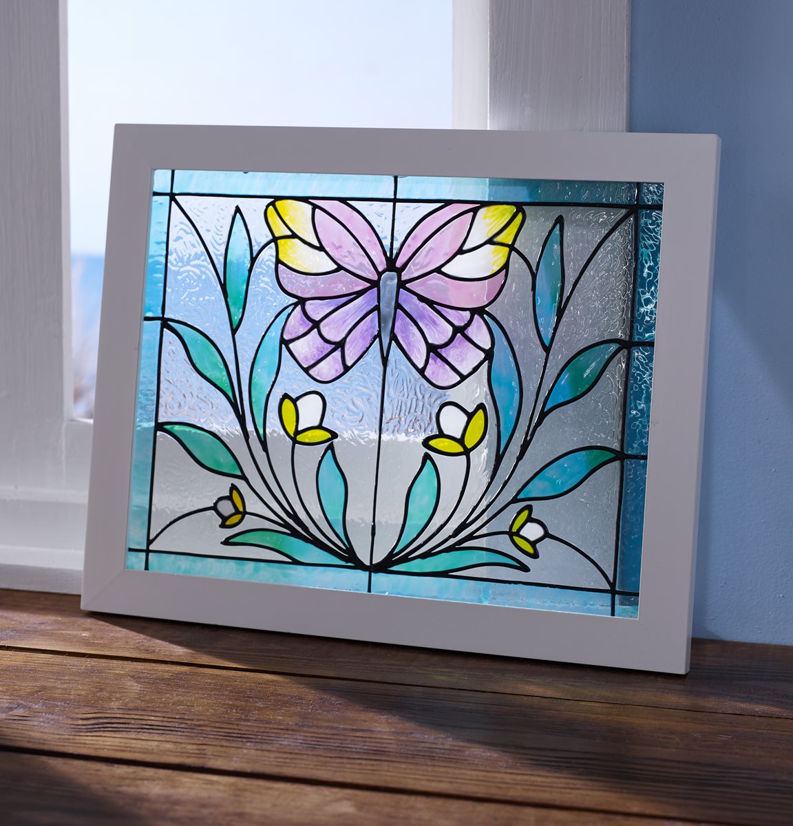 https://plaidonline.com/getattachment/Projects/Gallery-Glass-Pastel-Butterfly-with-Floral-Design/GG-Instructions-11x14-White-frame-with-pastel-butterfly-and-aqua-border-yellow-flowers-split-in-middle.jpg;