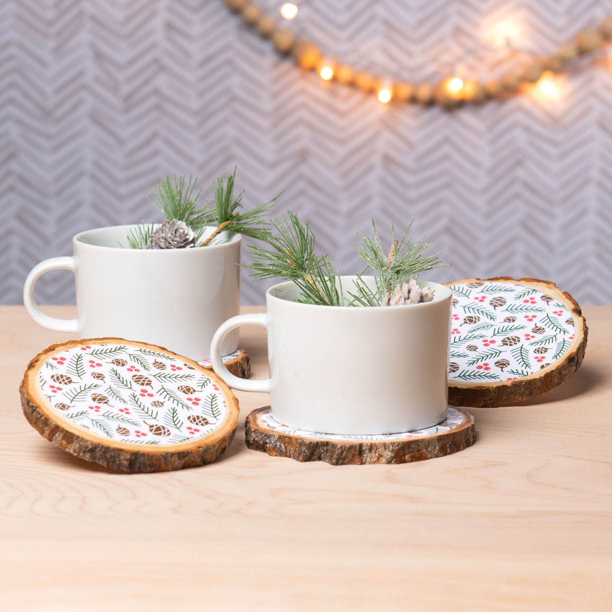 mugs on patterned wood coasters 