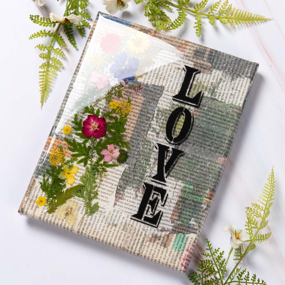 “Love” Resin Newspaper Canvas