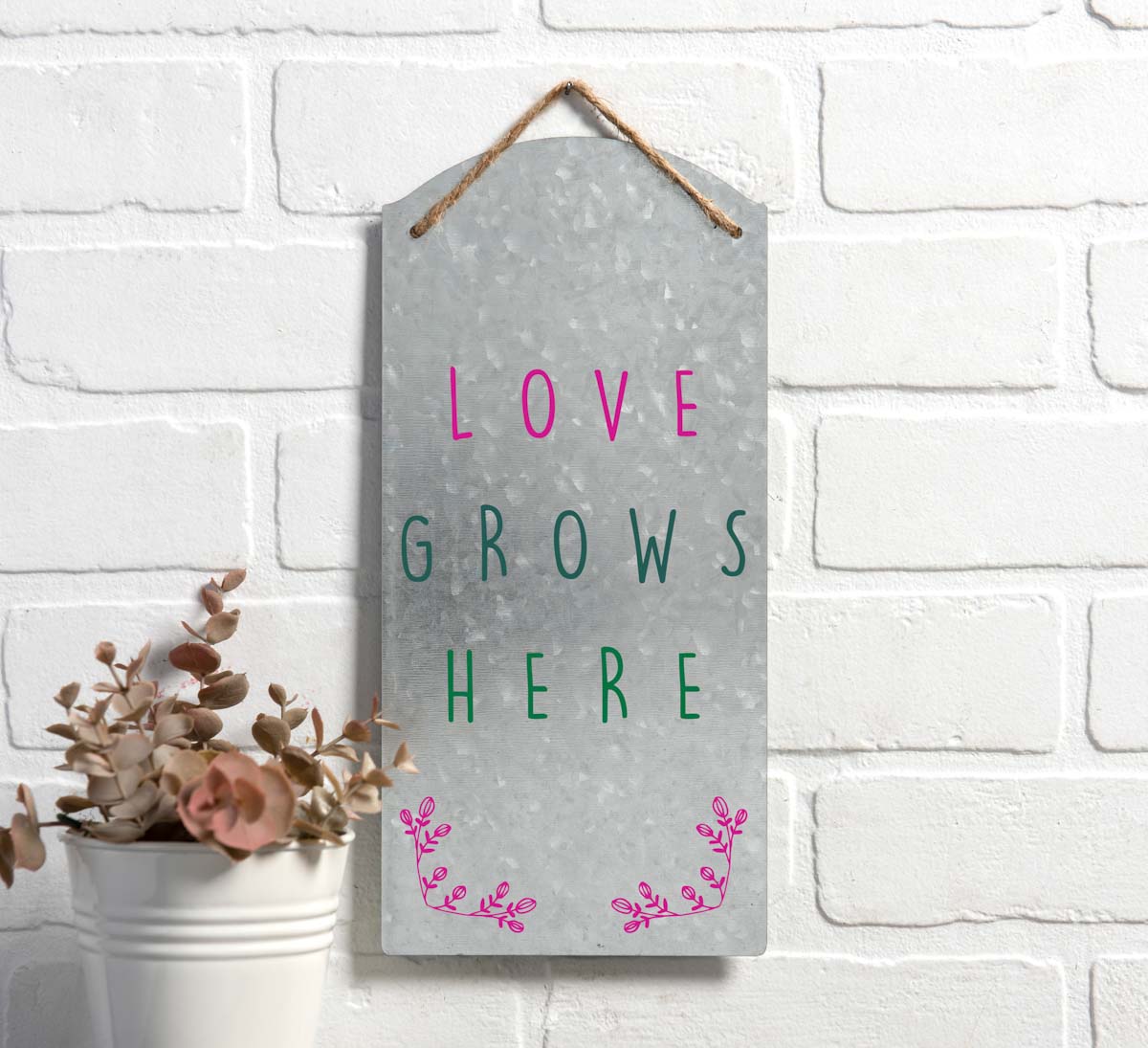 Love Grows Here Tin Sign