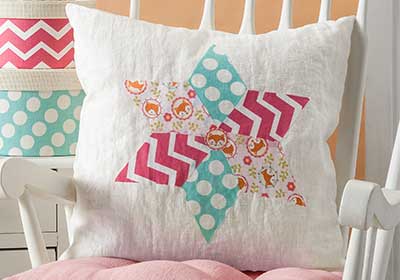 Faux Quilted Nursery Pillow with Fabric Mod Podge
